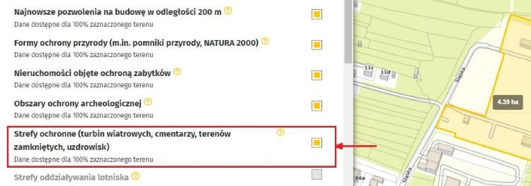 Wybór tematu w Raportach o Terenie, mapa stref wyłączonych wokół turbin wiatrowych
